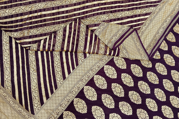 Banarasi khaddi silk georgette saree in brown with  diagonal lines on the body