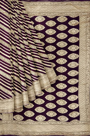 Banarasi khaddi silk georgette saree in brown with  diagonal lines on the body