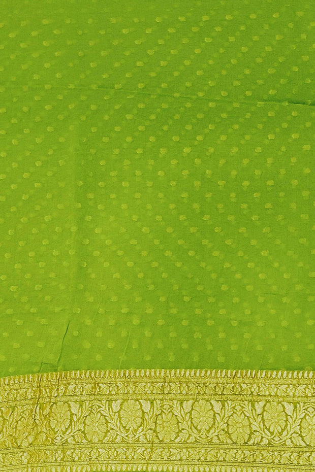 Banarasi silk georgette saree in  green  with small motifs