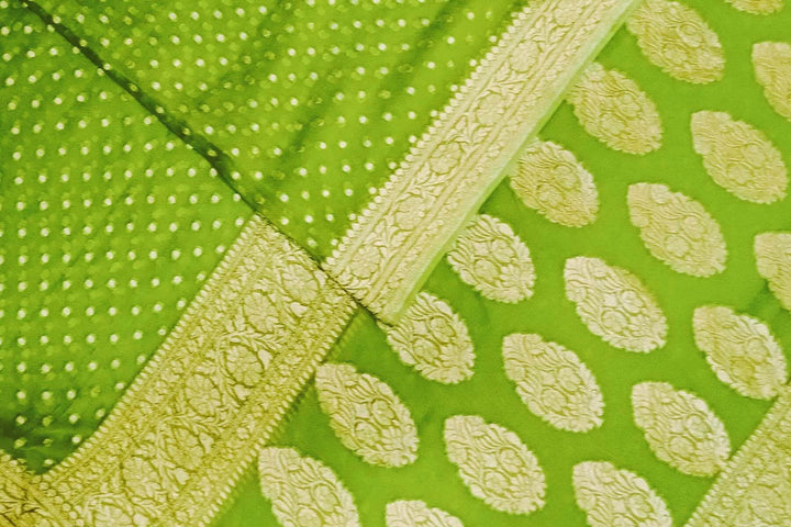 Banarasi silk georgette saree in  green  with small motifs