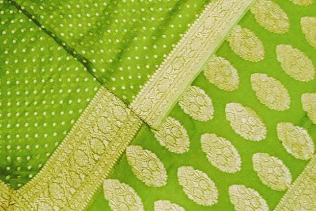 Banarasi silk georgette saree in  green  with small motifs