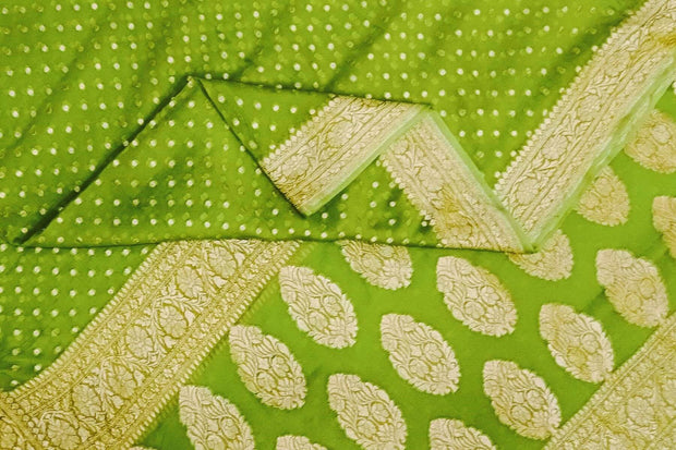 Banarasi silk georgette saree in  green  with small motifs