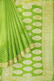 Banarasi silk georgette saree in  green  with small motifs