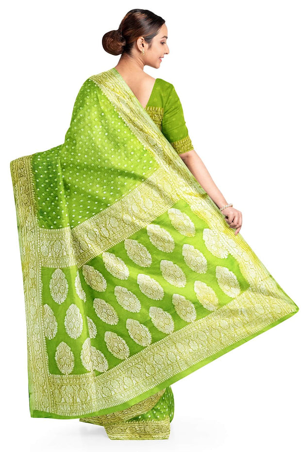 Banarasi silk georgette saree in  green  with small motifs