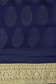 Banarasi silk georgette saree in  navy blue with small motifs