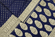 Banarasi silk georgette saree in  navy blue with small motifs