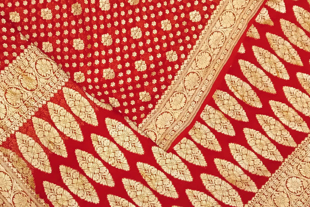Banarasi silk georgette saree in  red  with floral  motifs all over