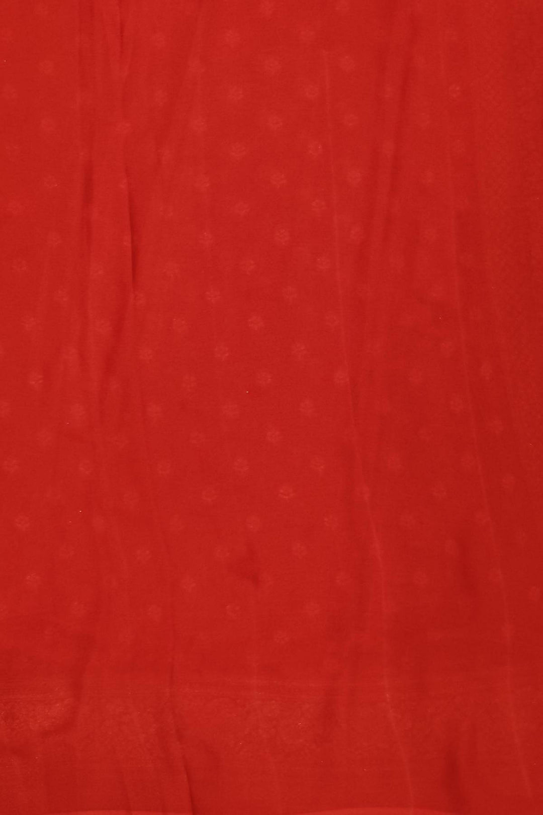 Banarasi silk georgette saree  in red with small motifs all over the body.