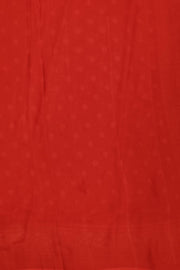 Banarasi silk georgette saree  in red with small motifs all over the body.