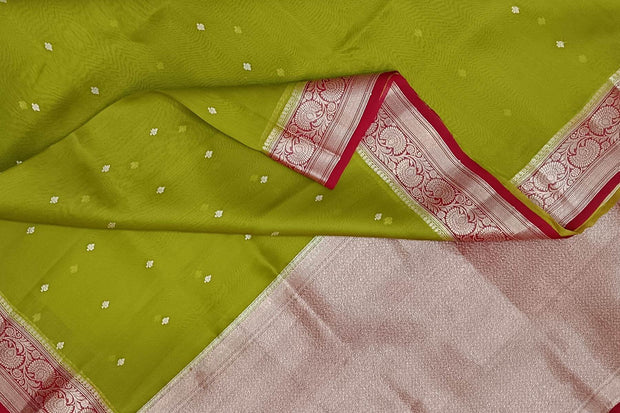 Banarasi kora ( organza) silk saree in mehndi green  with small motifs
