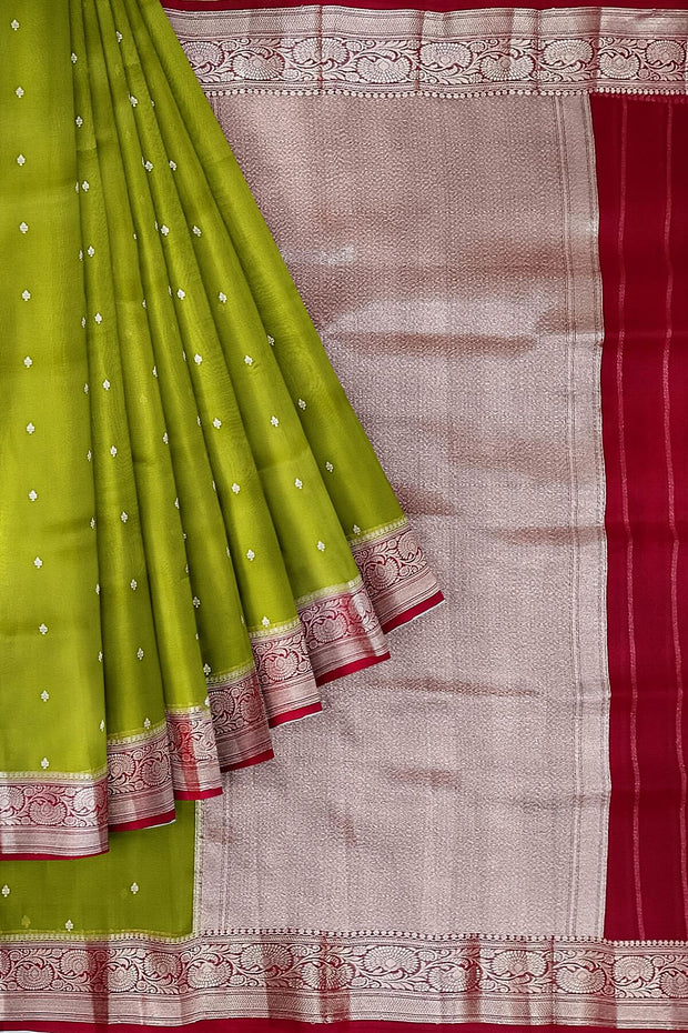 Banarasi kora ( organza) silk saree in mehndi green  with small motifs