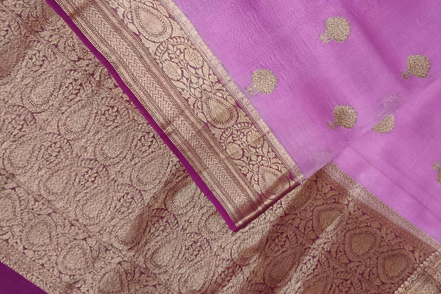 Banarasi kora ( organza) silk saree in pink  with floral motifs in  gold
