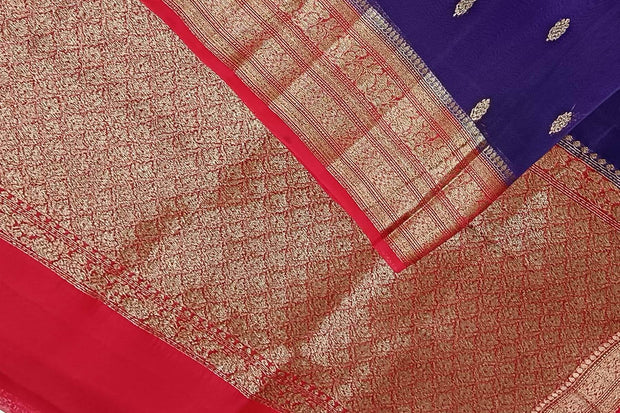 Banarasi kora ( organza) silk saree in violet  with small  motifs in gold
