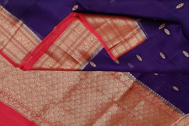 Banarasi kora ( organza) silk saree in violet  with small  motifs in gold