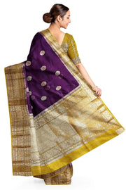 Banarasi kora ( organza) silk saree in wine  with floral  motifs in  gold .