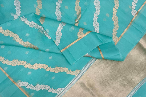 Banarasi kora (organza) silk saree in sea blue in half & half style.