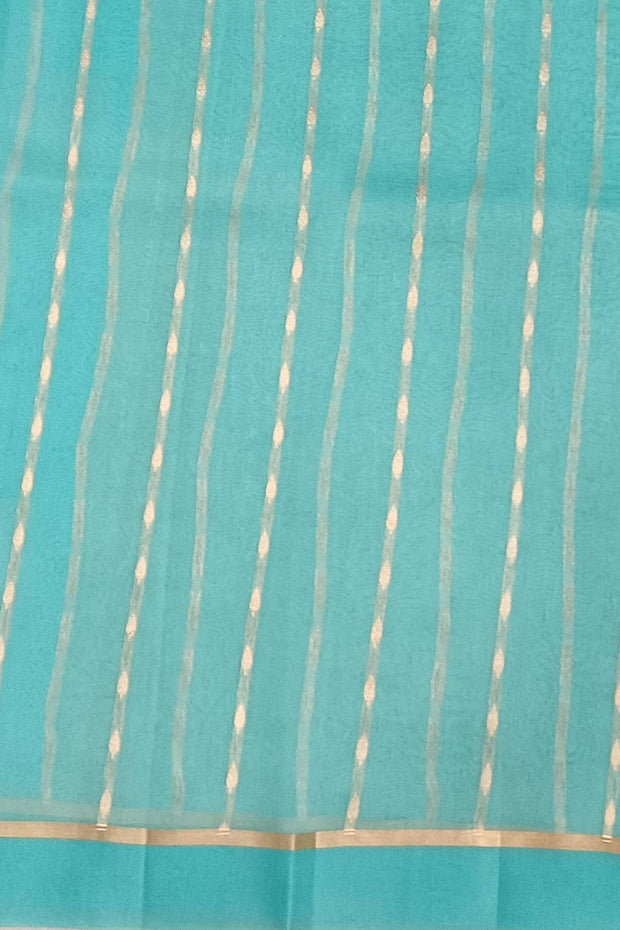 Banarasi kora (organza) silk saree in pool blue with floral motifs