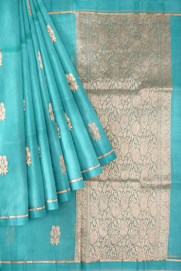 Banarasi kora (organza) silk saree in pool blue with floral motifs
