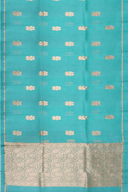 Banarasi kora (organza) silk saree in pool blue with floral motifs