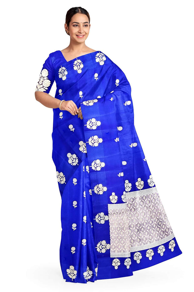 Banarasi kora (organza) silk saree in royal blue with   floral motifs in gold & silver.
