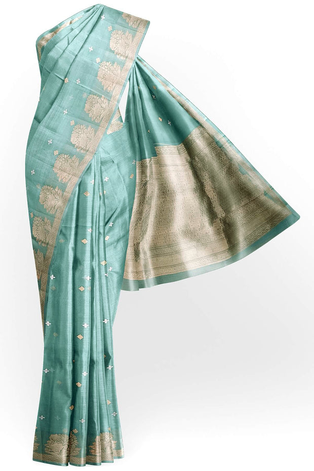 Banarasi kora (organza) silk saree in mint green with small floral motifs in gold & silver .