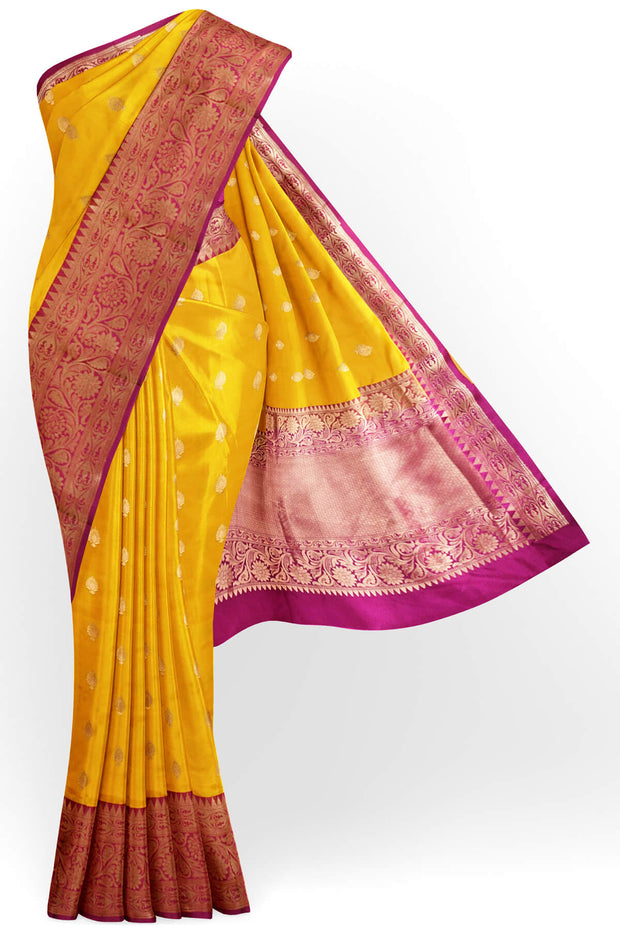 Handloom Banarasi katan pure silk saree in yellow with rich zari border.