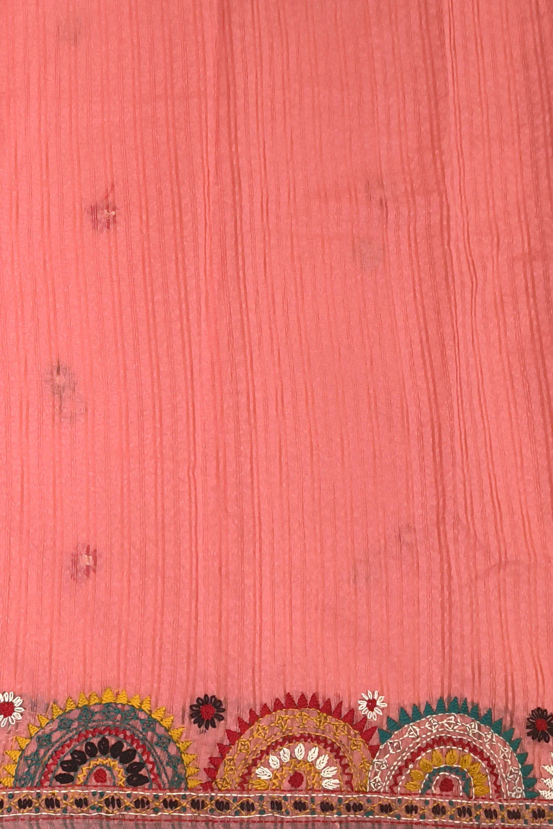 Lambani hand embroidery on a  chanderi saree in  peach