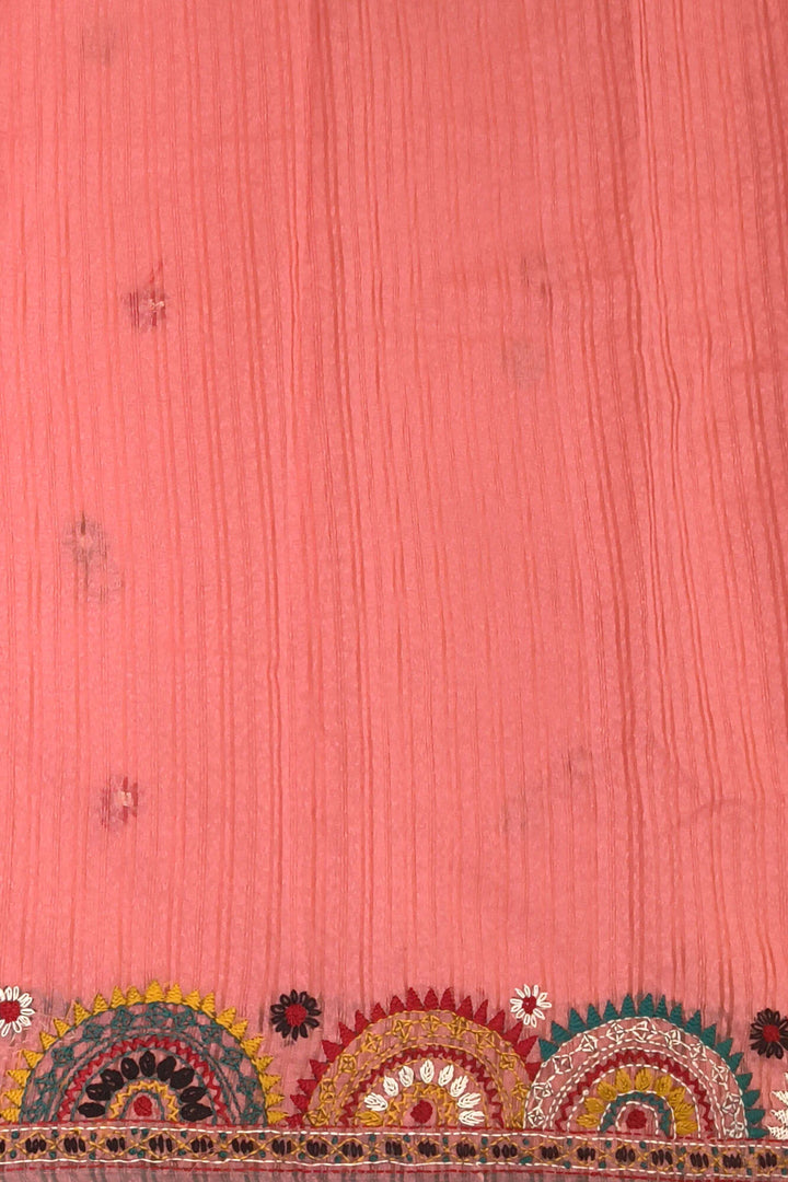 Lambani hand embroidery on a  chanderi saree in  peach
