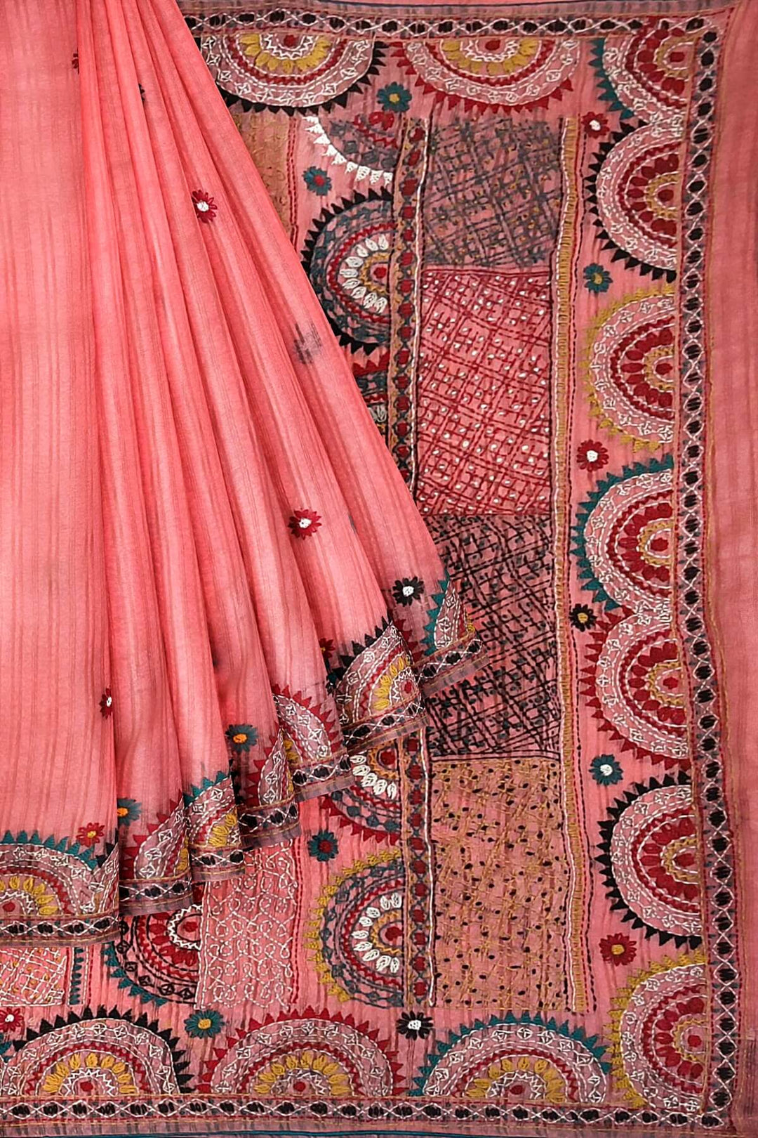 Lambani hand embroidery on a  chanderi saree in  peach