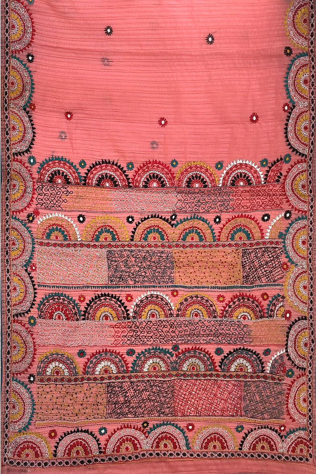Lambani hand embroidery on a  chanderi saree in  peach