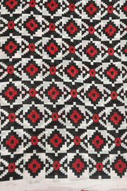 Jaipur mul cotton saree in black with elephant & bird motifs.