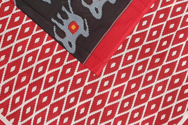 Jaipur mul cotton saree in black with elephant & bird motifs.