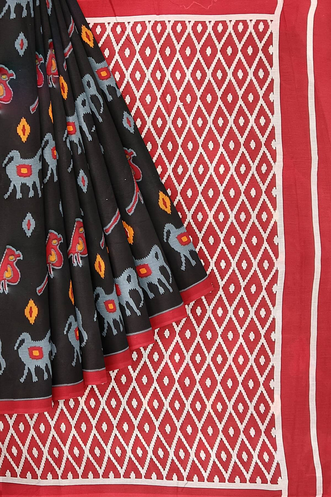Jaipur mul cotton saree in black with elephant & bird motifs.