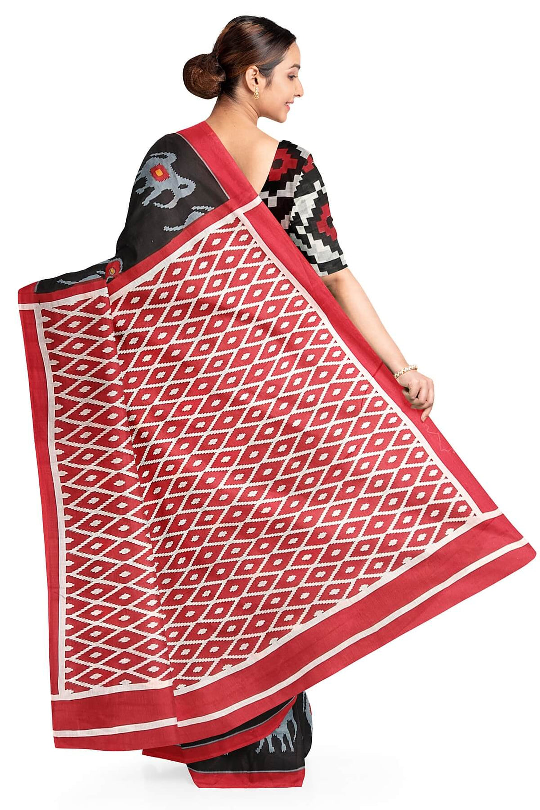 Jaipur mul cotton saree in black with elephant & bird motifs.