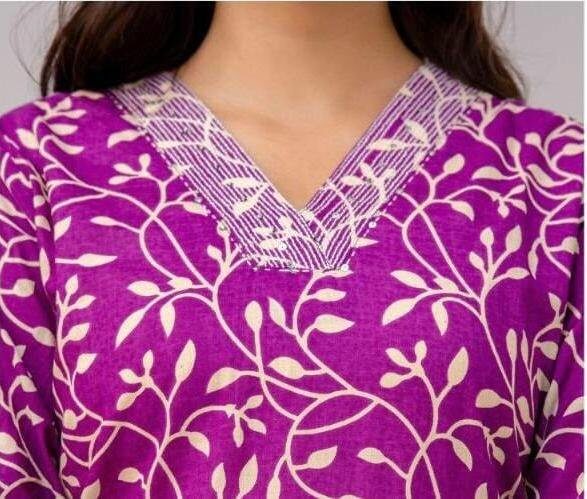 Cotton kurti  in straight cut in purple.