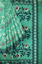 Handwoven silk cotton saree in teal green with all over jamdani weave