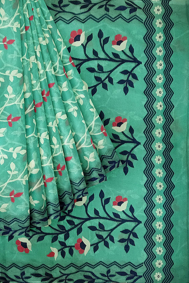 Handwoven silk cotton saree in teal green with all over jamdani weave