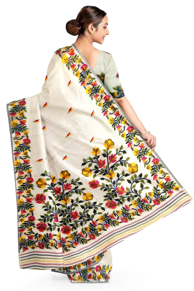 Handloom silk cotton saree in  white with small motifs on the body
