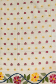 Handloom silk cotton saree in  white with all over  multicolour floral vines in  jamdani weave