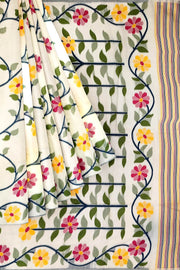 Handloom silk cotton saree in  white with all over  multicolour floral vines in  jamdani weave