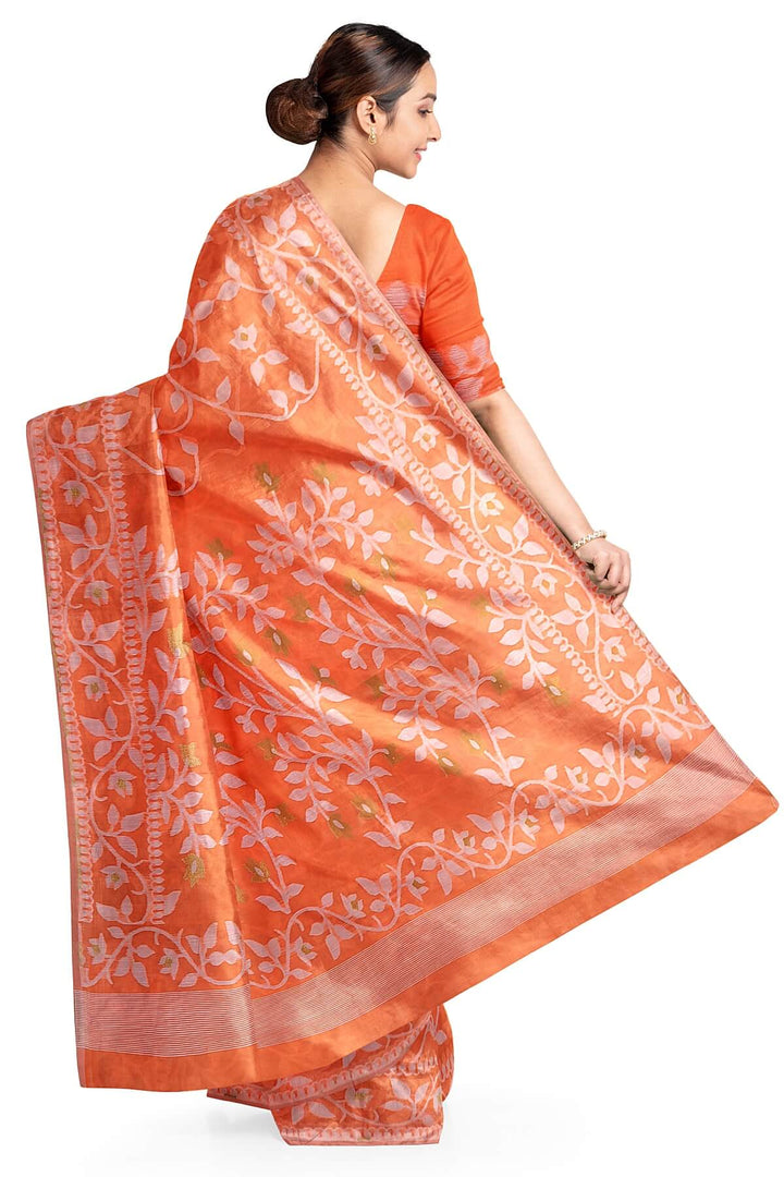 Handloom silk cotton saree in orange in floral jamdani weave