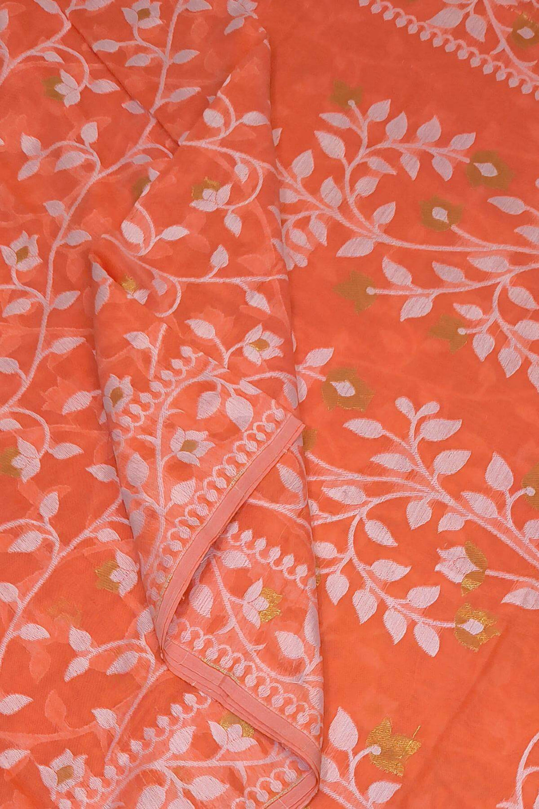 Handloom silk cotton saree in orange in floral jamdani weave