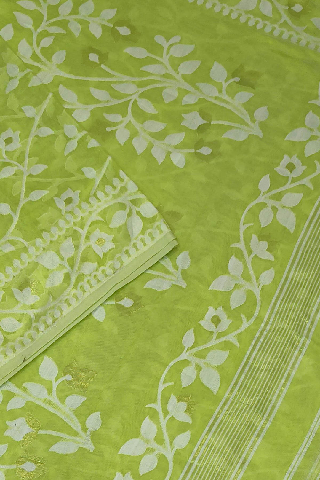 Handloom silk cotton saree in green in floral jamdani weave