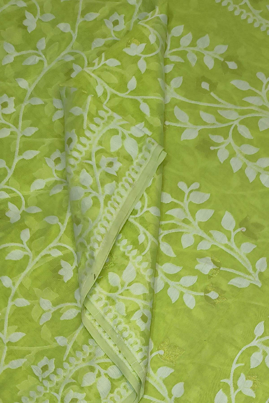 Handloom silk cotton saree in green in floral jamdani weave