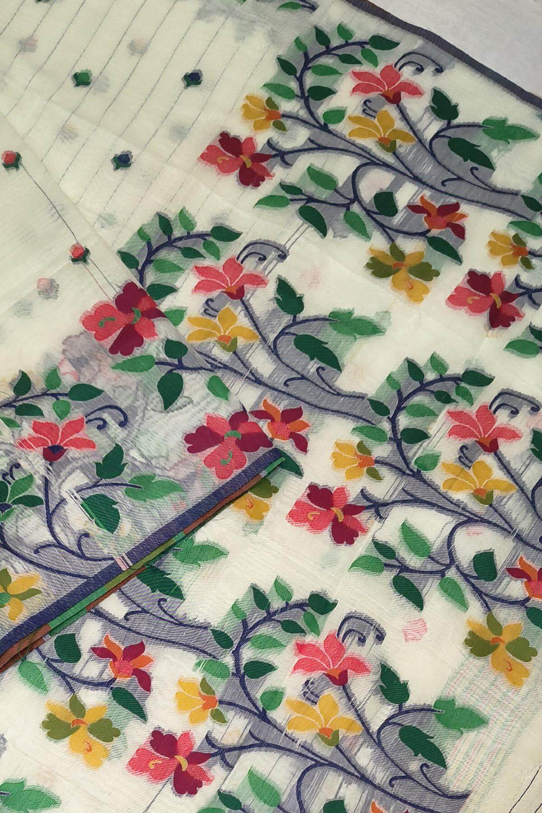 silk cotton saree in  white with small motifs