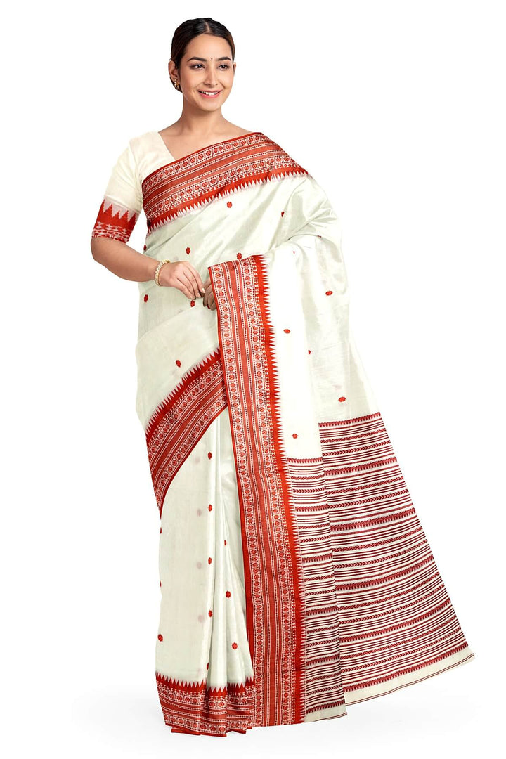 Mercersed cotton saree in white with bhujodi worked   pallu & border.