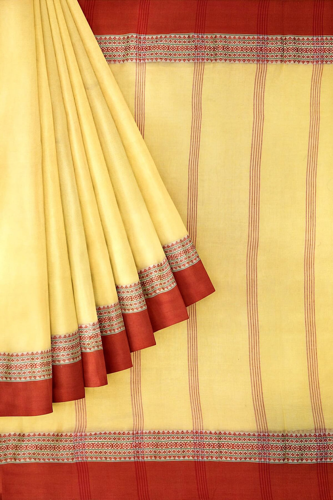 Soft cotton saree in light yellow with Dhonekali thread work pallu & border