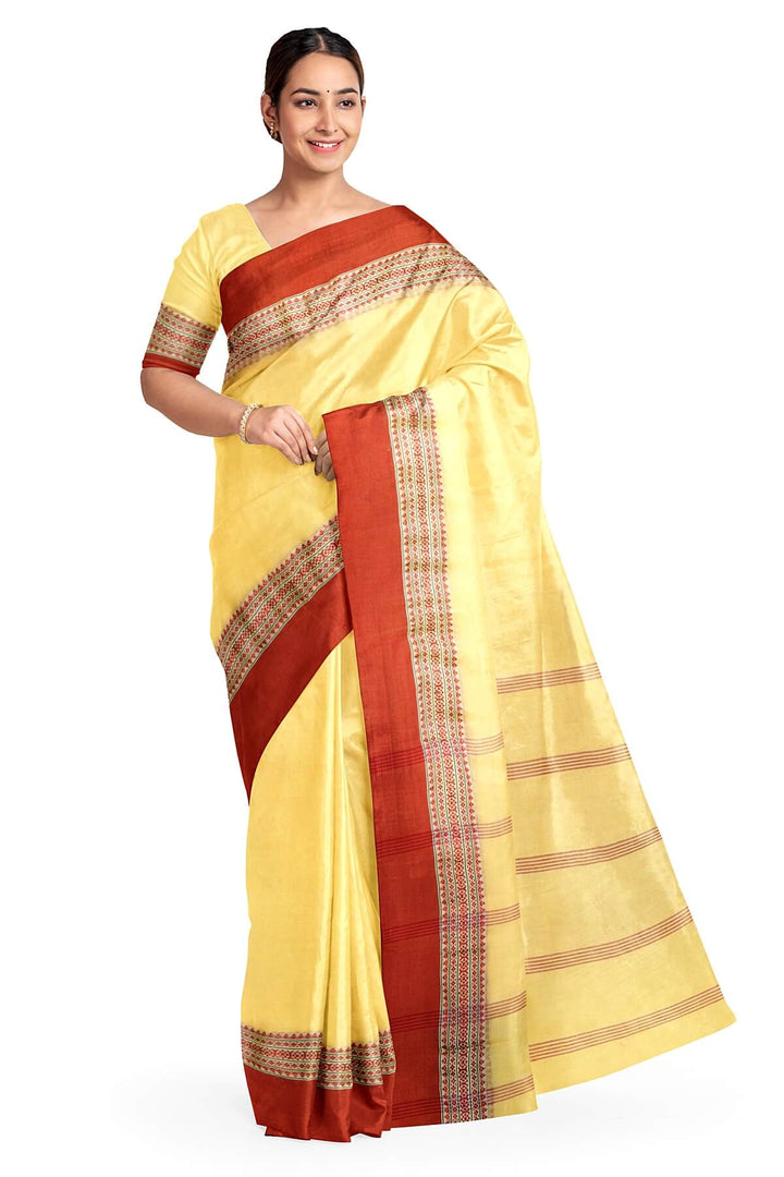 Soft cotton saree in light yellow with Dhonekali thread work pallu & border