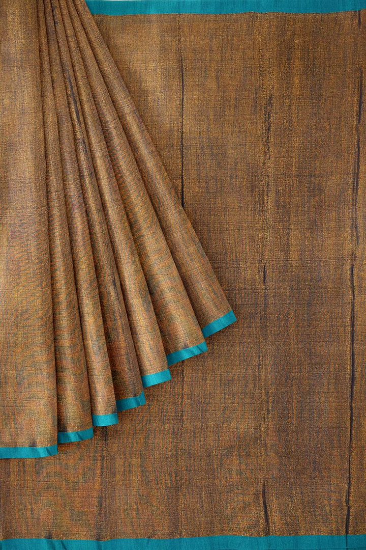 Small border soft tissue cotton saree in copper