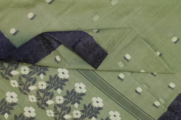Cotton saree in green with floral motifs in Jamdani weave